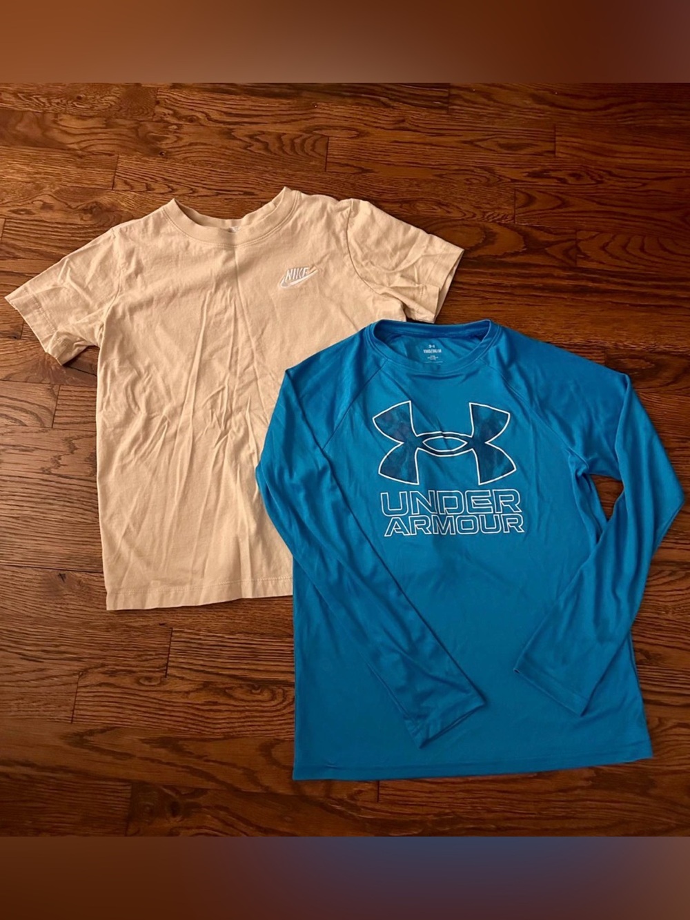 2 Shirts: Boys Nike t-shirt & Under Armour dri-fit long sleeve, size M
